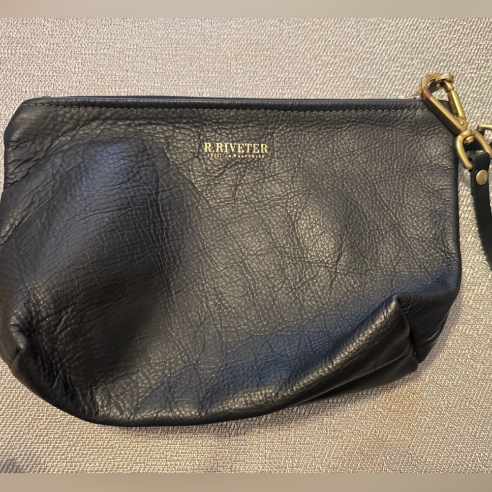 R. Riveter leather clutch